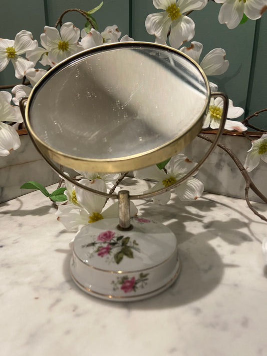 Miroir rond sur pied en porcelaine